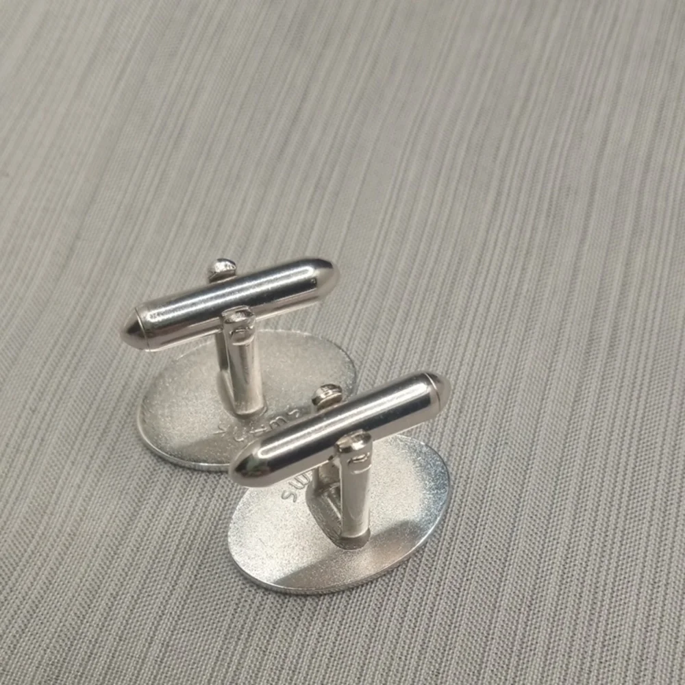 Silver Toned Oval Cufflinks By Swank